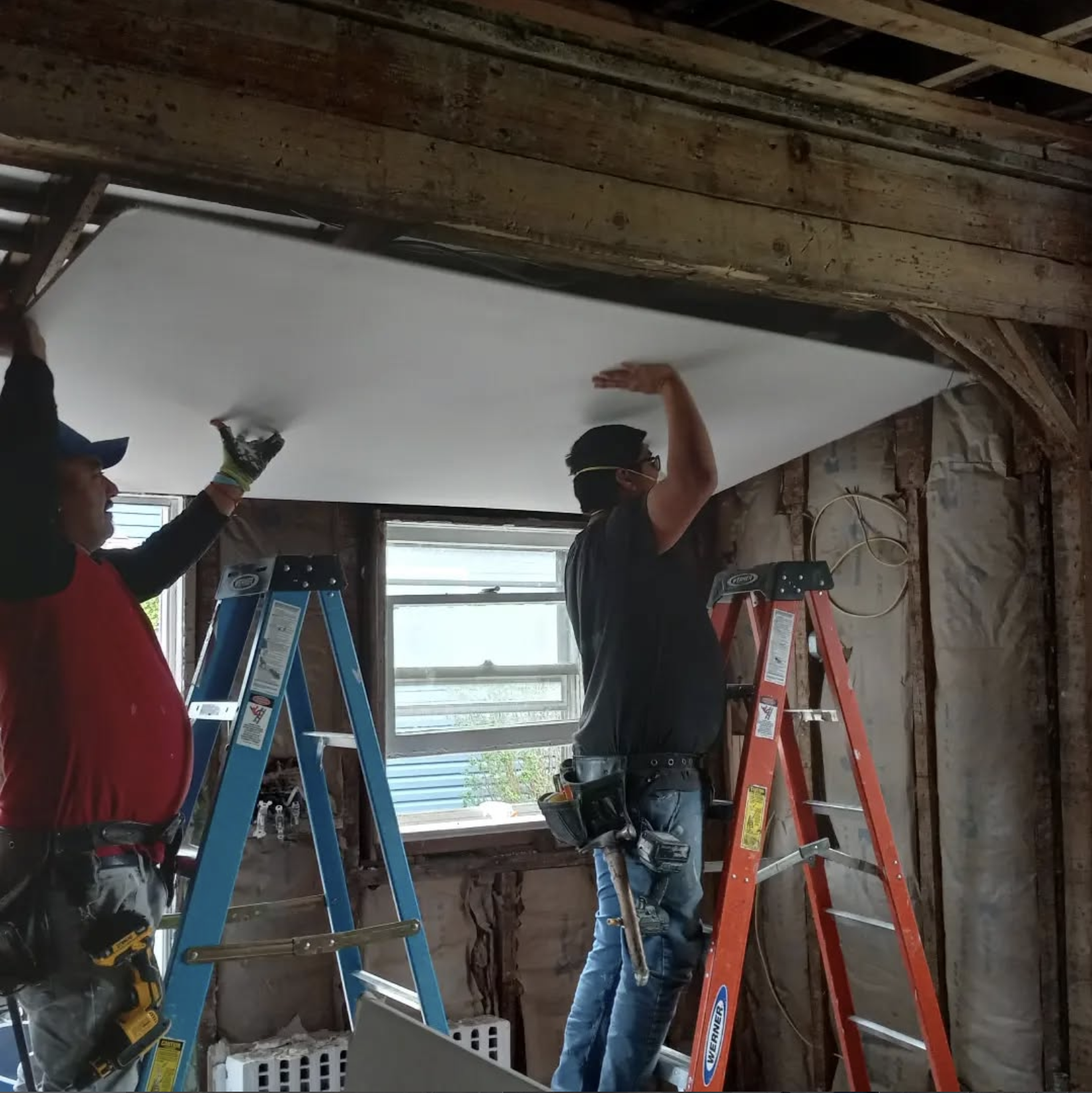 Tupul Homes crew performing structural build-out work